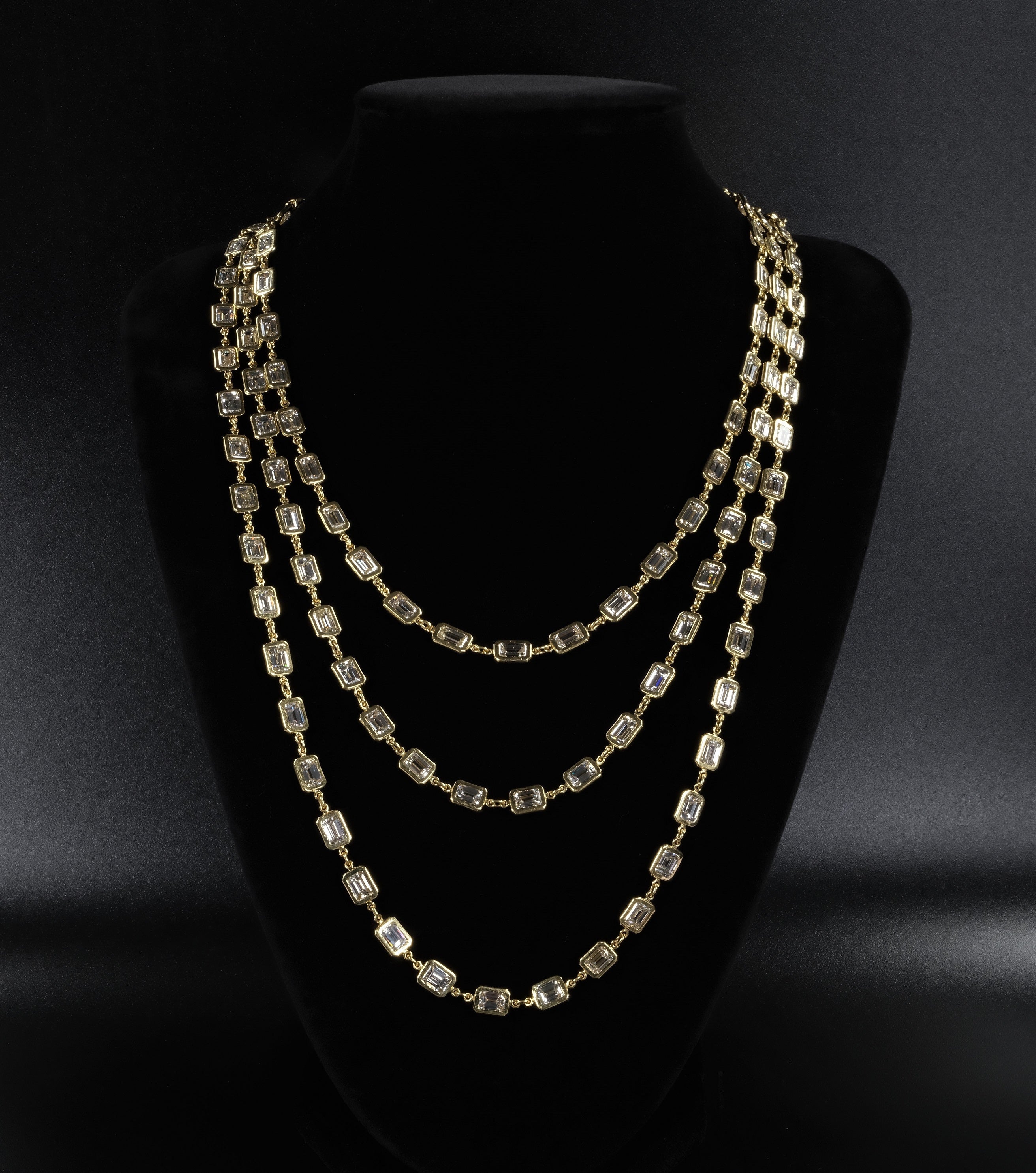 Layered emerald-cut diamond necklace in yellow gold
