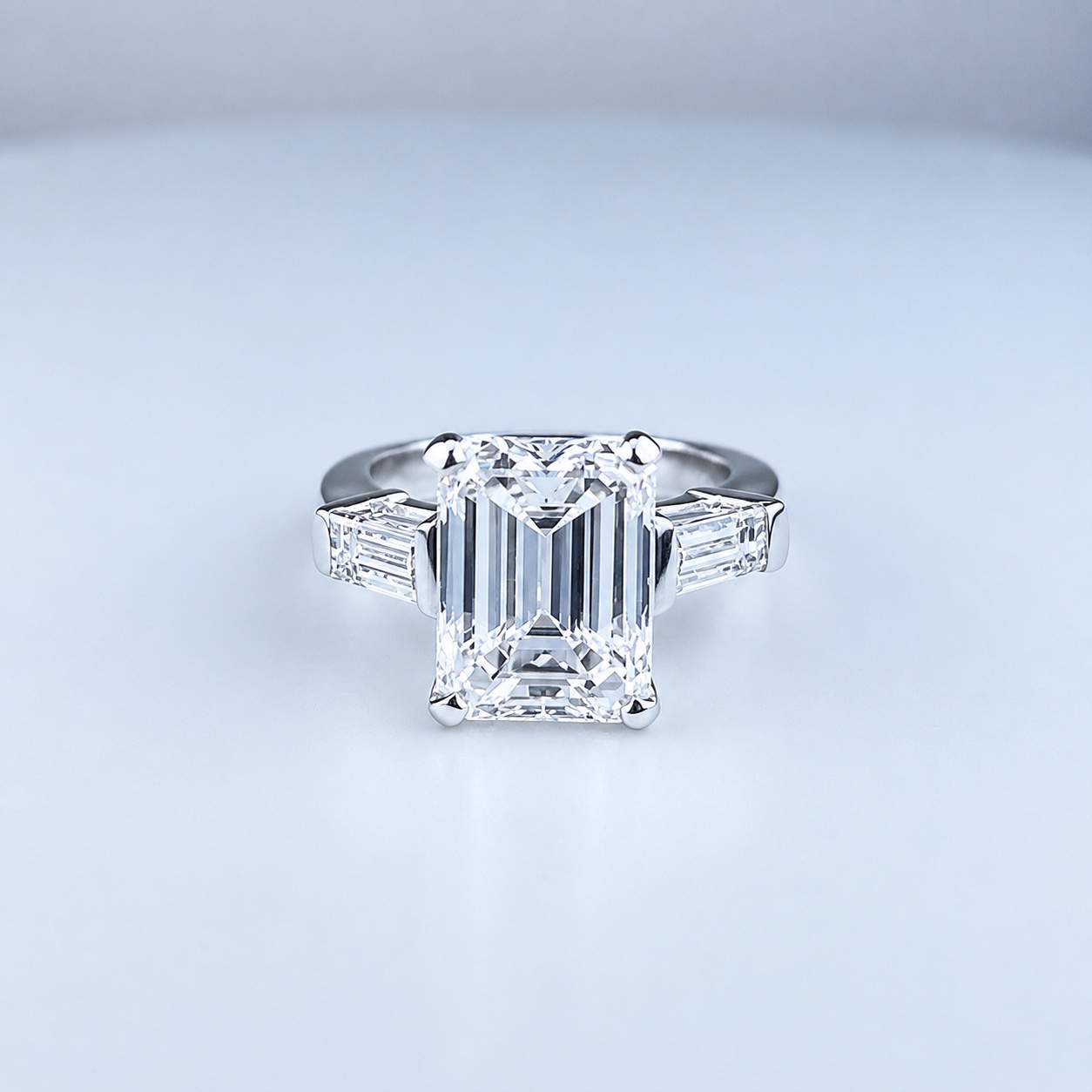 Emerald-cut diamond ring with tapered baguette side stones
