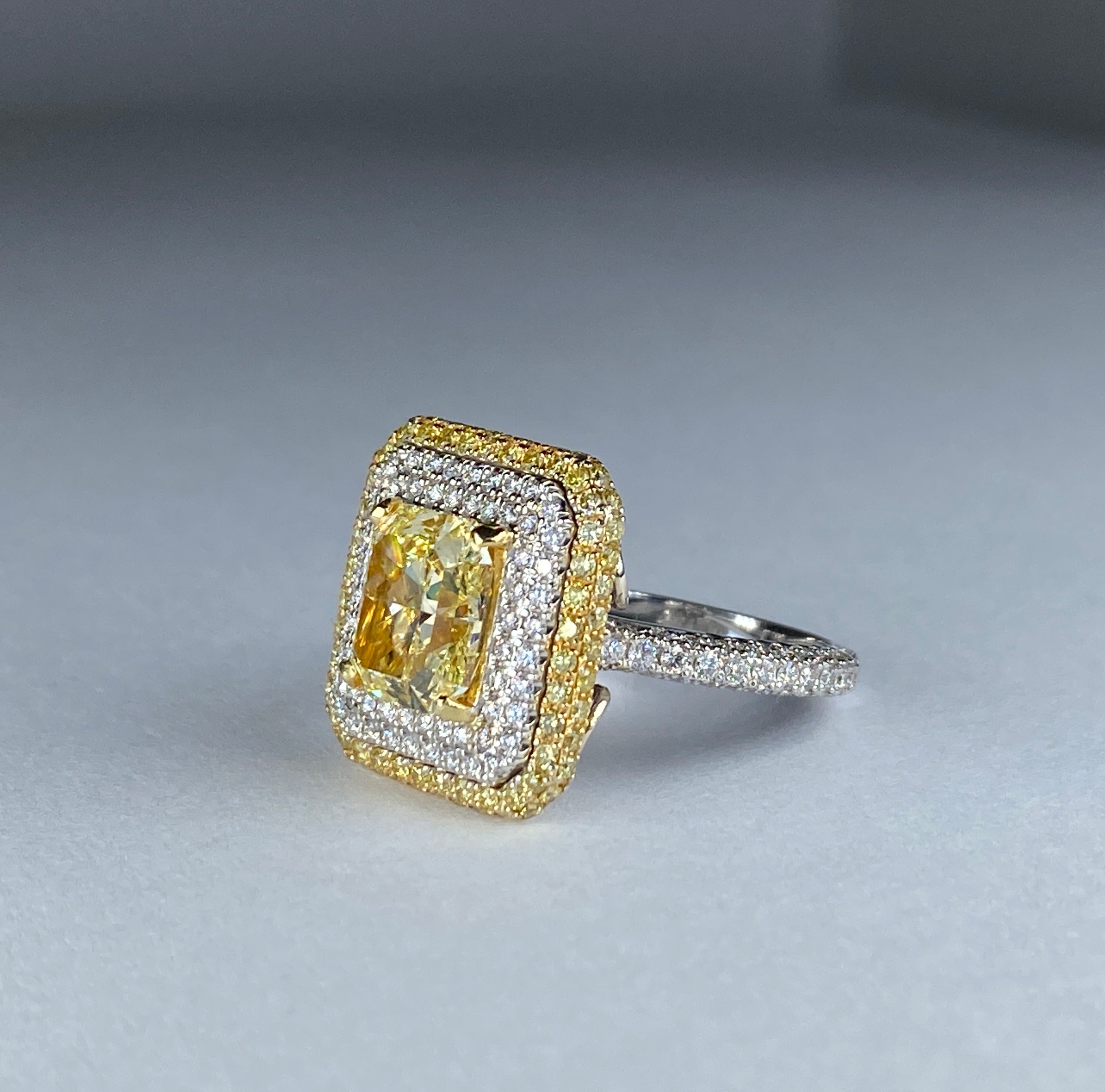 Fancy intense yellow diamond ring